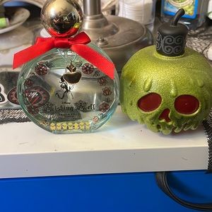 Two Bottles Snow White Themed Perfumes